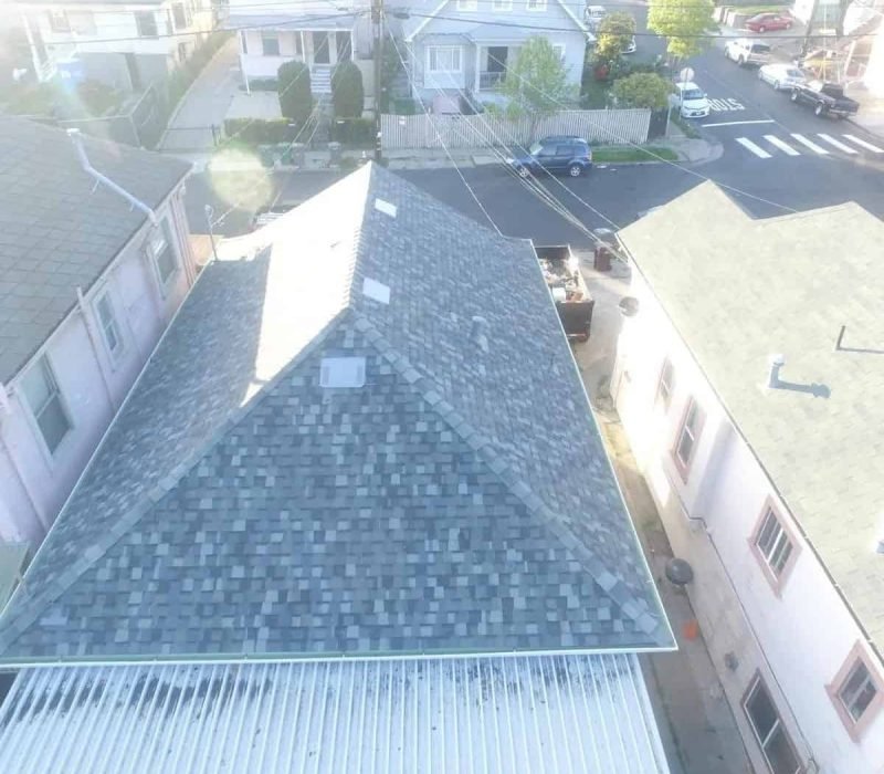 New asphalt shingle roof installed on a residential home by Castellanos Roofing.